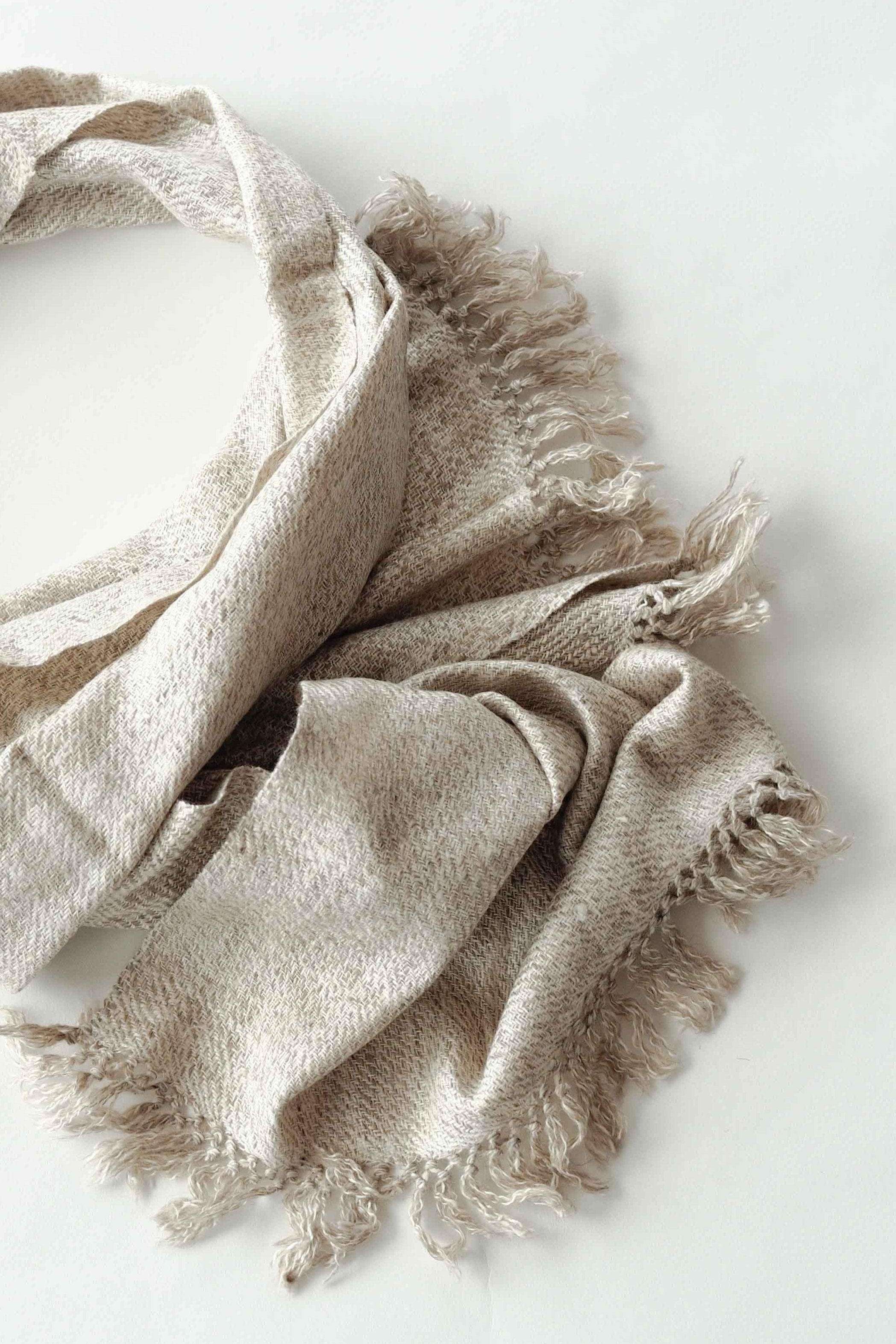 Autumn and winter Scarf made from organic peace silk and Himalayan lambswool on a handloom in India. A beautiful blend of wool and eri silk, handspun and handwoven in Himachal Pradesh, India. Organic and natural material, 70% eri silk and 30% lambswool. Slow and ethically made.  