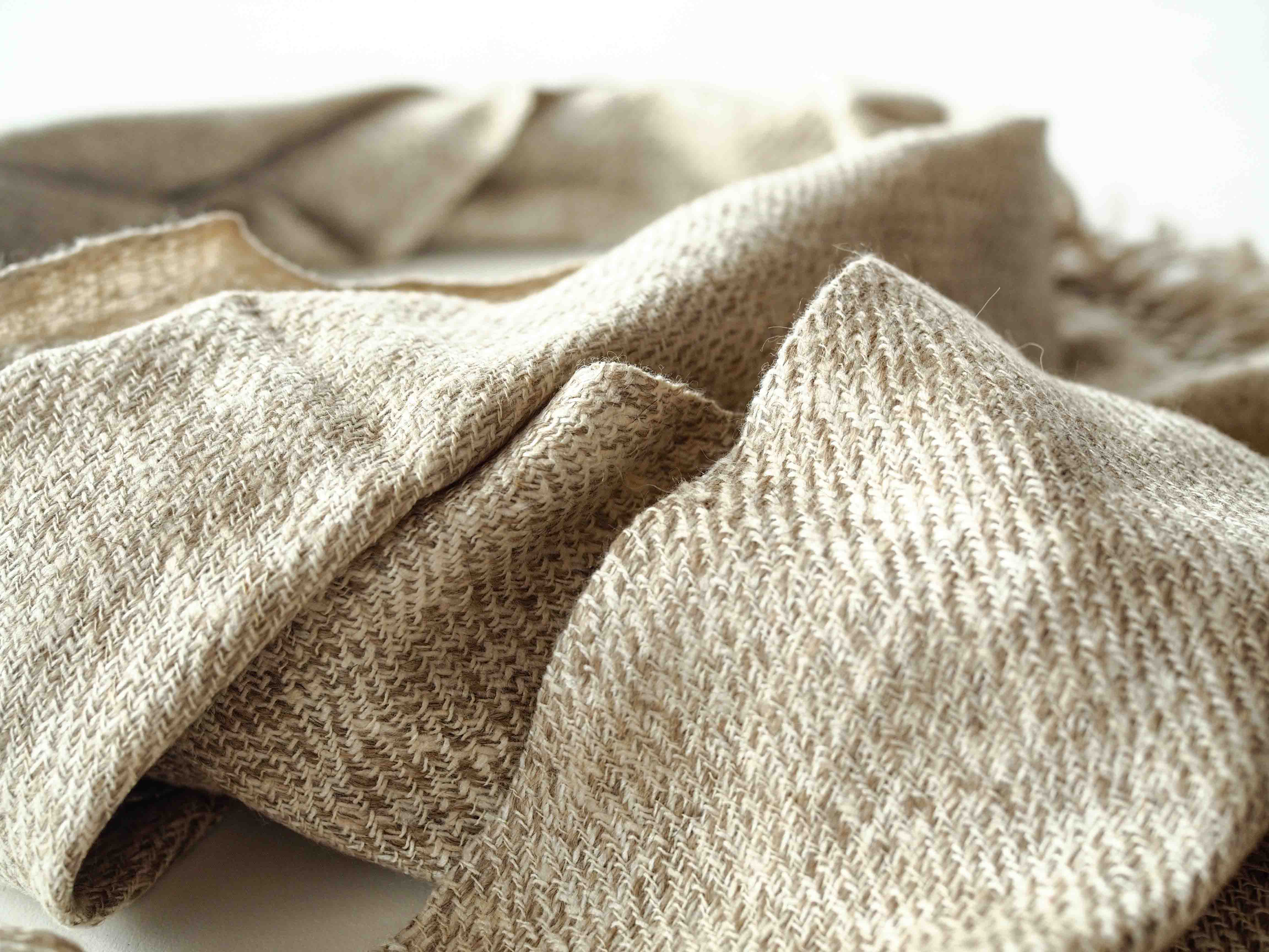 Autumn and winter Scarf made from organic peace silk and Himalayan lambswool on a handloom in India. A beautiful blend of wool and eri silk, handspun and handwoven in Himachal Pradesh, India. Organic and natural material, 70% eri silk and 30% lambswool. Slow and ethically made.  