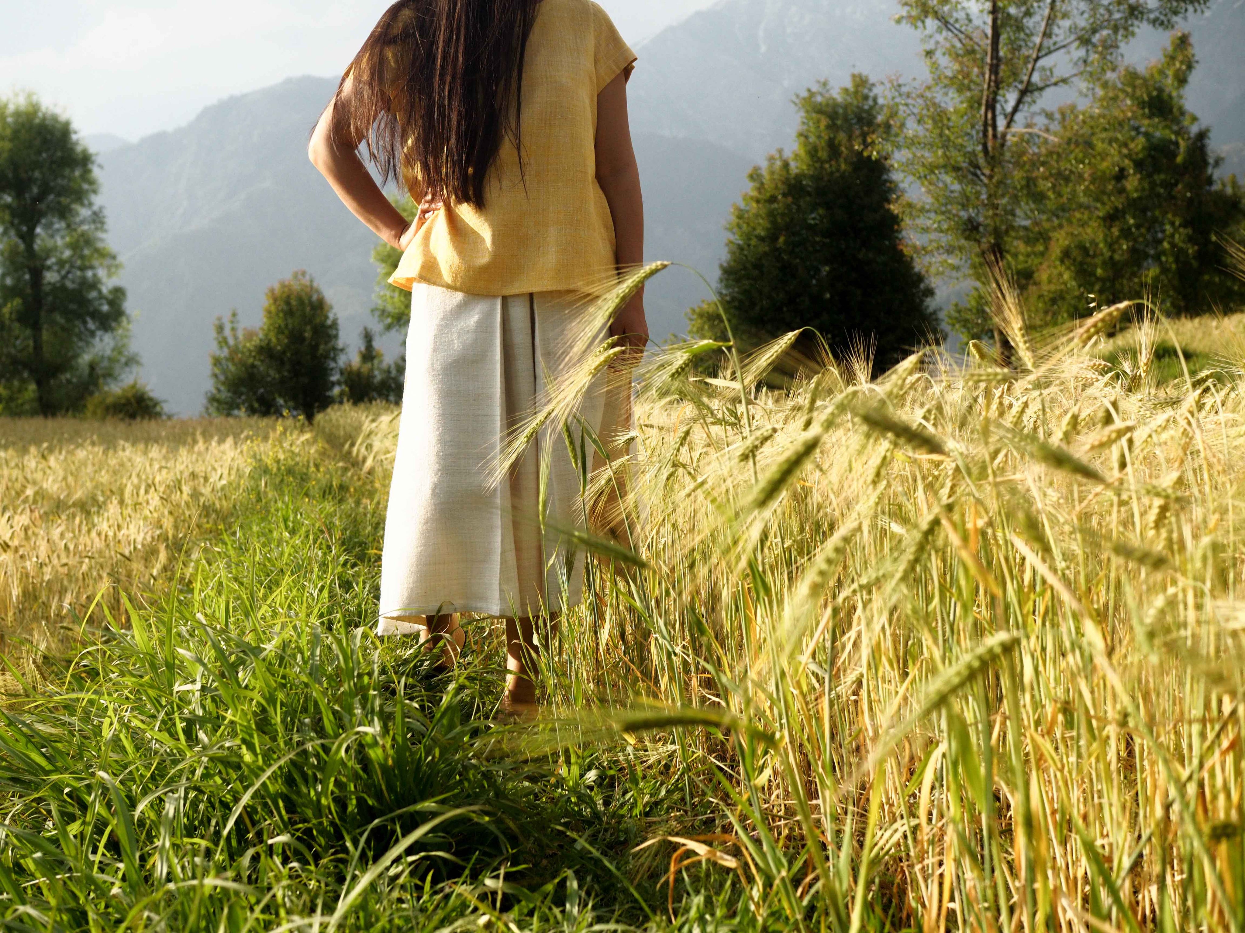 Handspun and handwoven eri silk shirt in a yellow color. 100% natural fiber and naturally dyed with turmeric. Ethically made, slow fashion, simplicity.