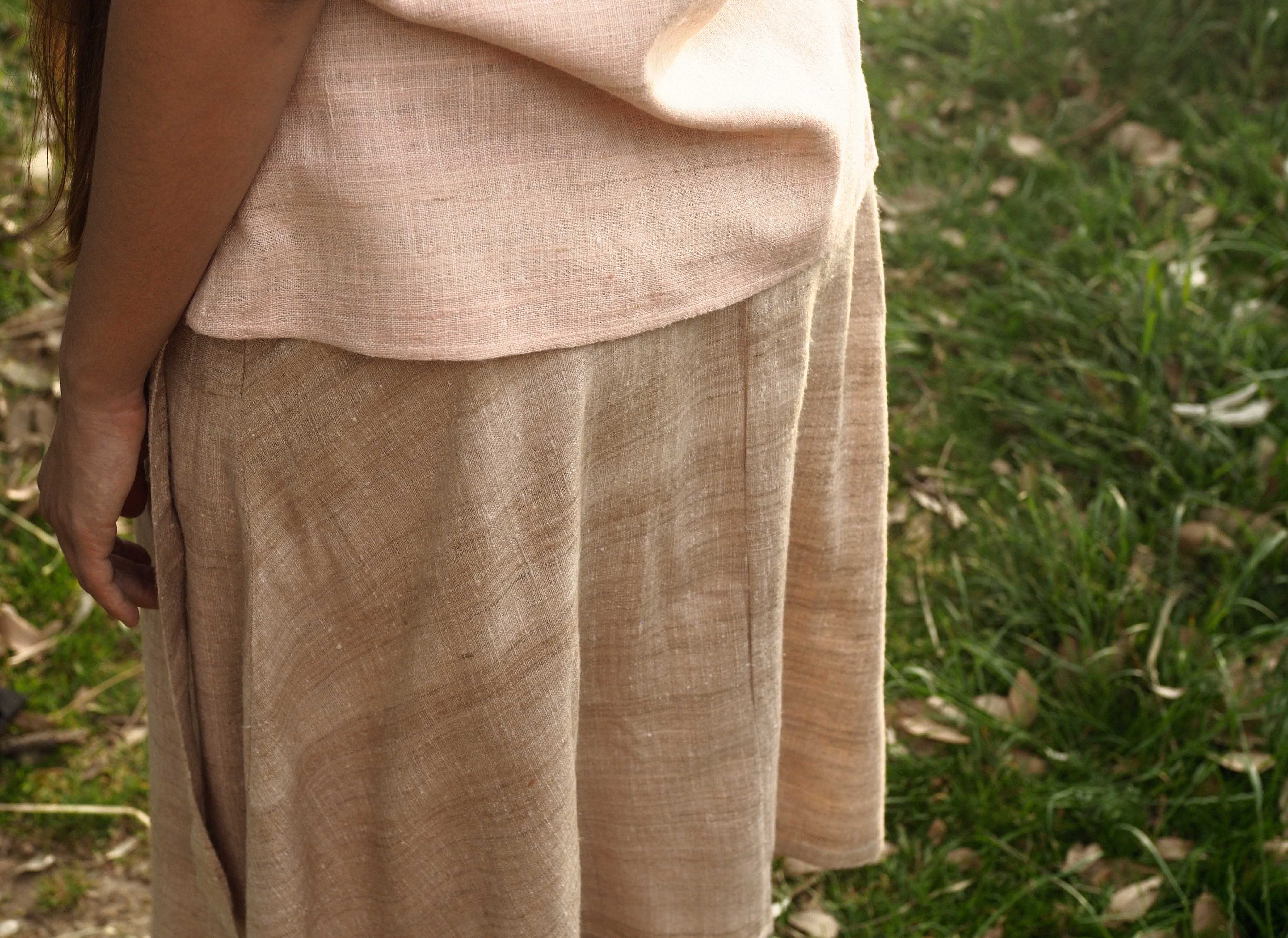 Handspun and handwoven eri silk shirt in a salmon and apricot color. 100% natural fiber and naturally dyed with Indian madder roots. Ethically made, slow fashion, simplicity.
