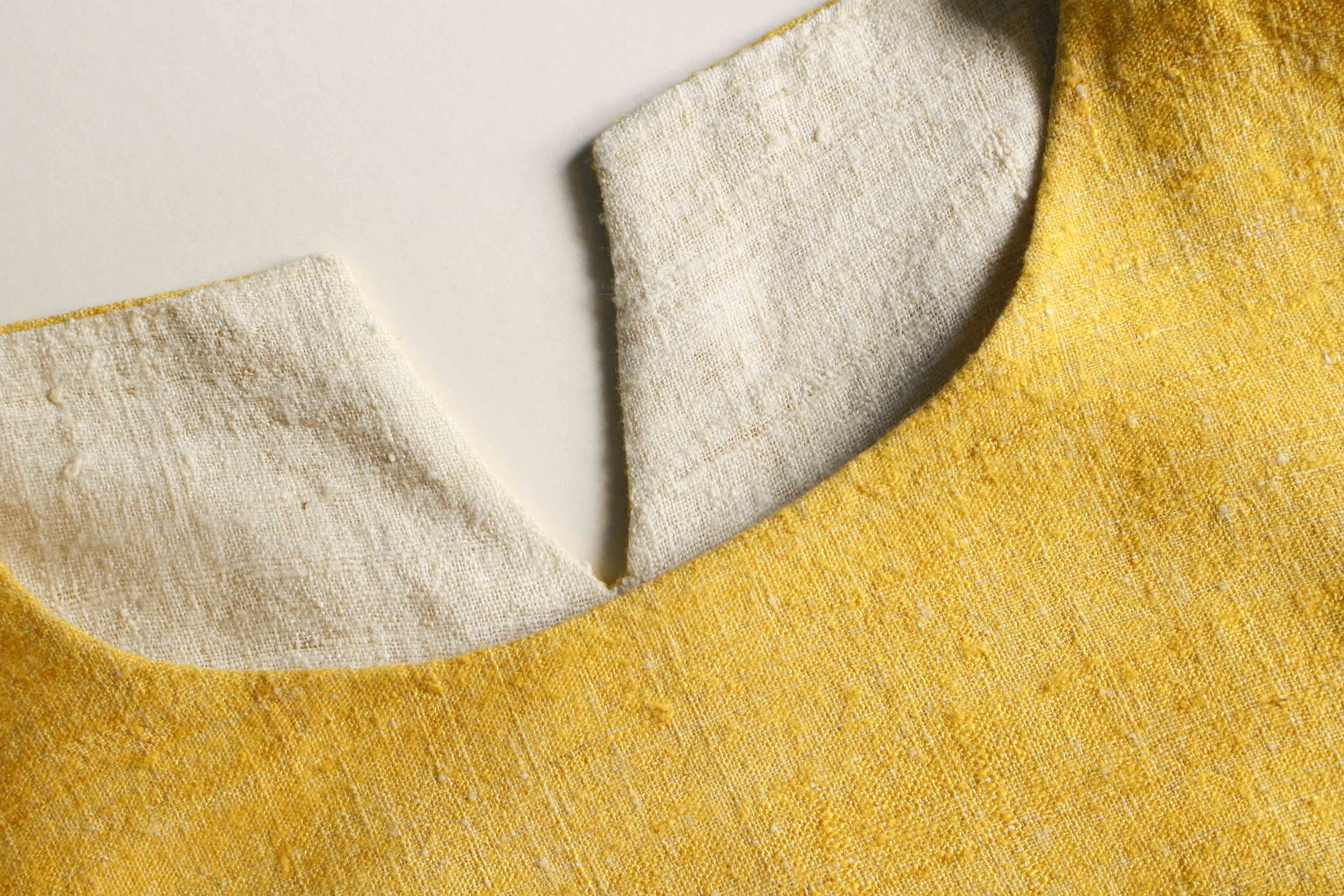 Handspun and handwoven eri silk top in a yellow color. 100% natural fiber and naturally dyed with turmeric. Ethically made, slow fashion, simplicity.