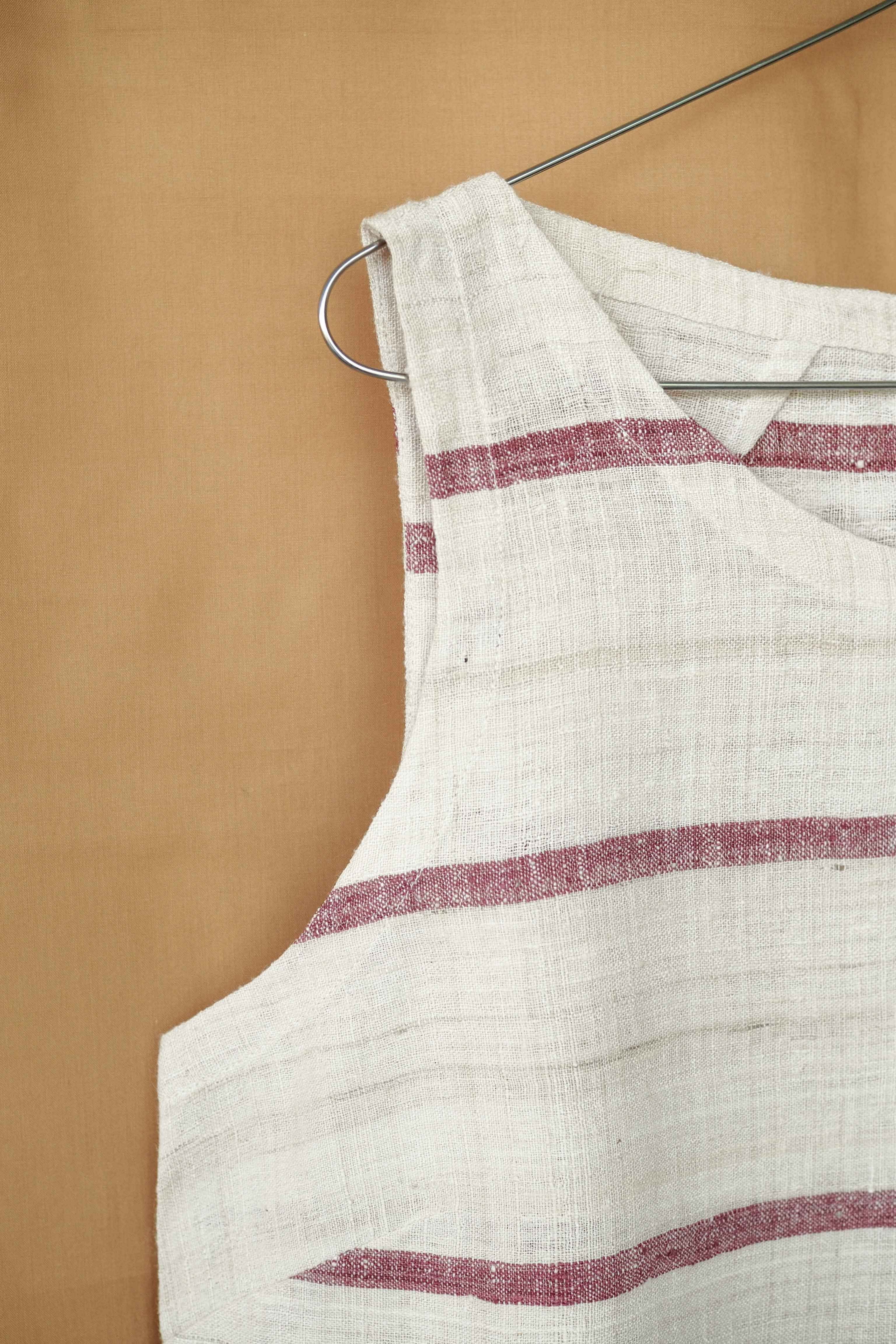Handspun and handwoven eri silk top in a pink and cream color. 100% natural fiber and naturally dyed with lac. Ethically made, slow fashion, simplicity.