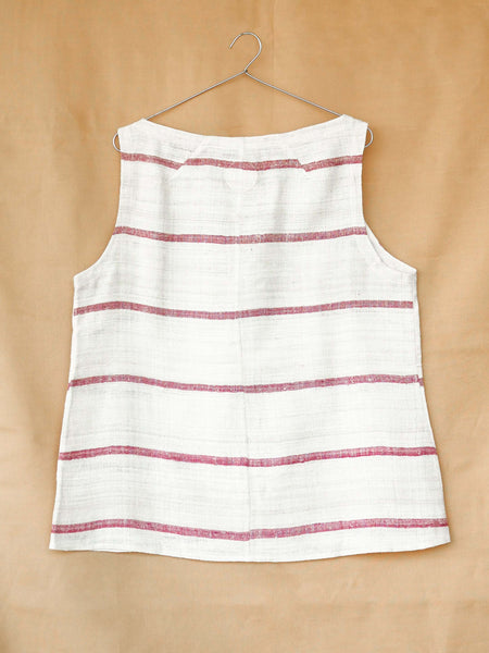 Handspun and handwoven eri silk top in a pink and cream color. 100% natural fiber and naturally dyed with lac. Ethically made, slow fashion, simplicity.