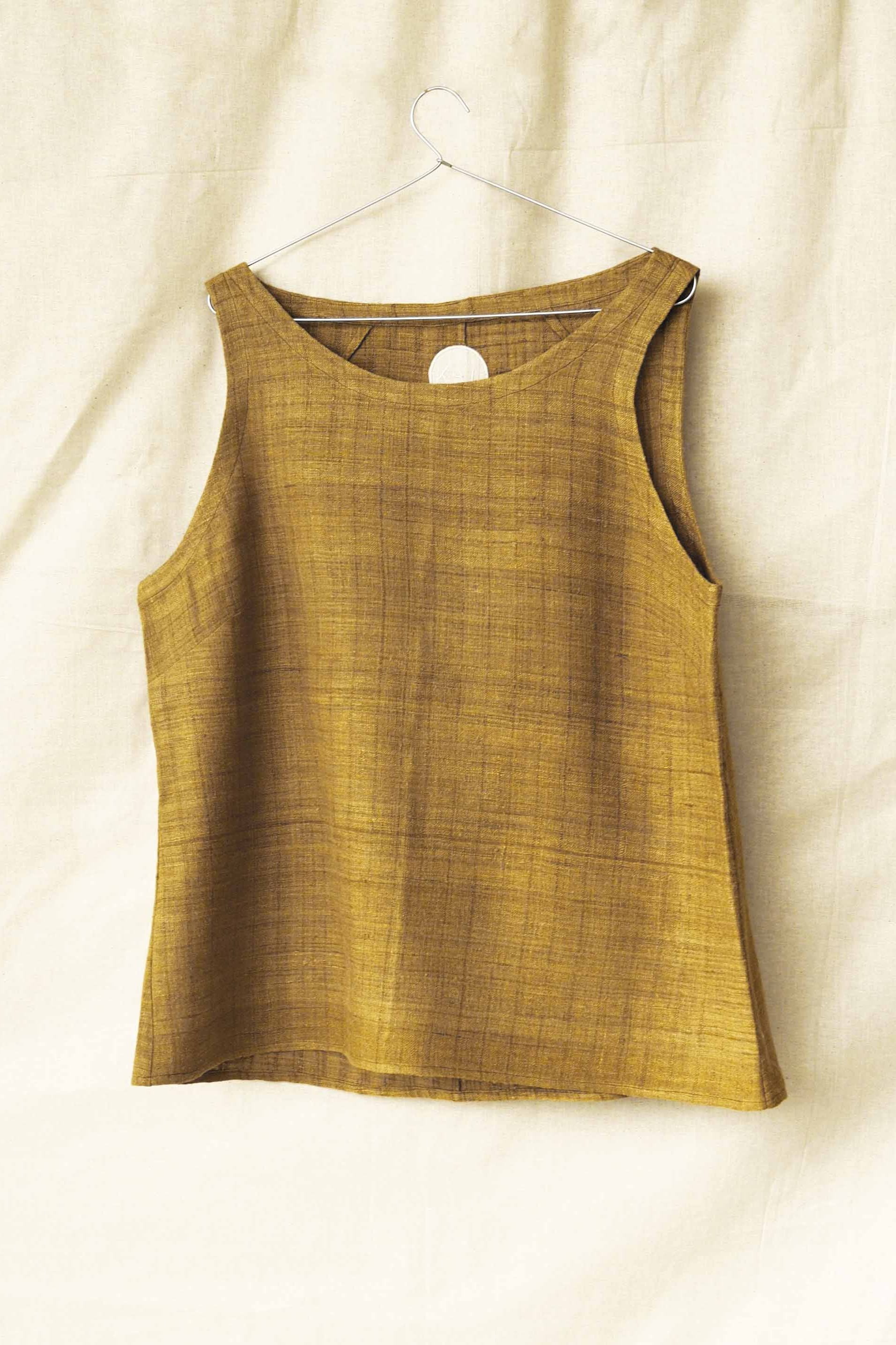 Handspun and handwoven eri silk top in a mustard color. 100% natural fiber and naturally dyed with onion skins. Ethically made, slow fashion, simplicity.