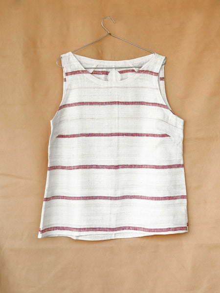 Handspun and handwoven eri silk top in a pink and cream color. 100% natural fiber and naturally dyed with lac. Ethically made, slow fashion, simplicity.