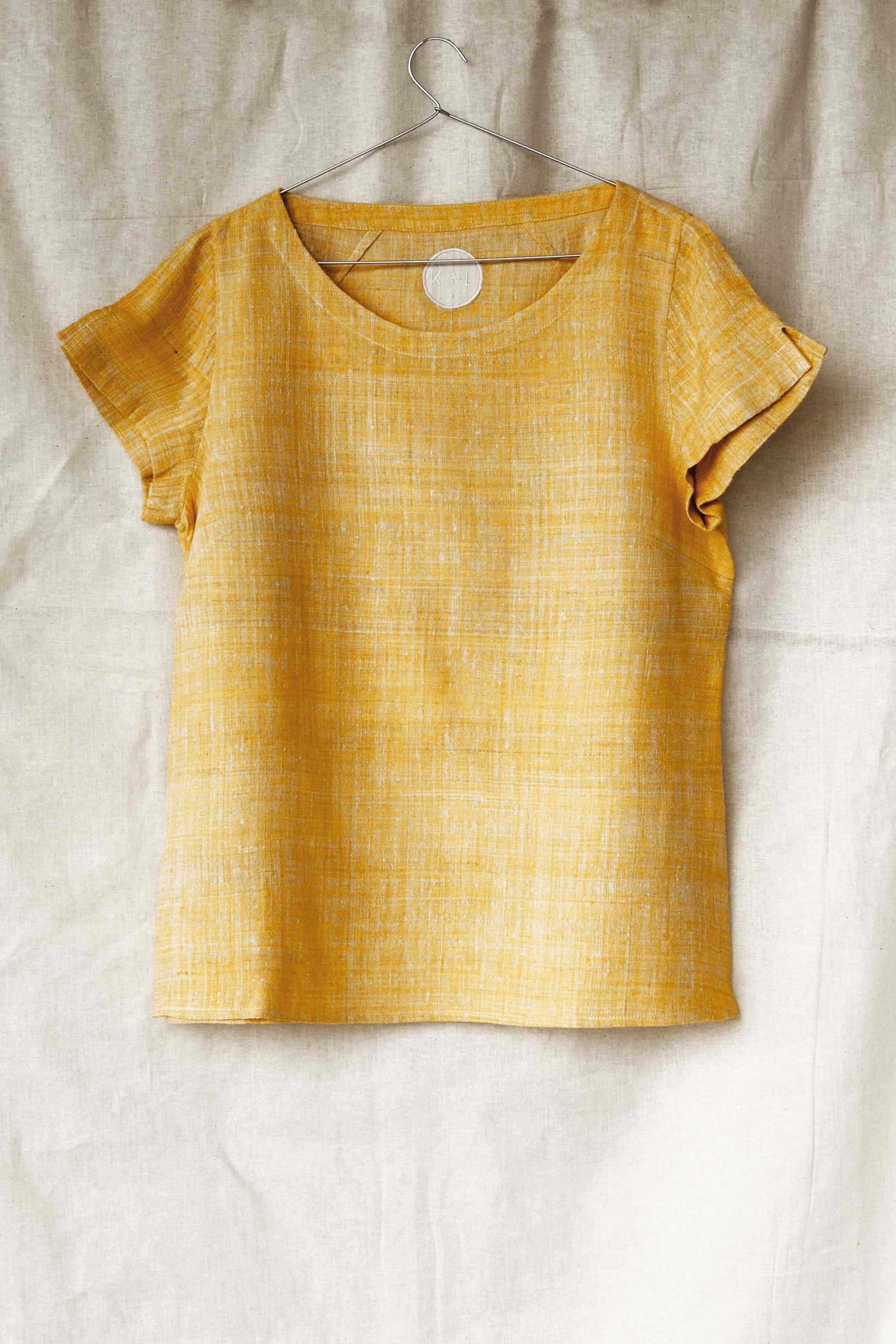 Handspun and handwoven eri silk shirt in a yellow color. 100% natural fiber and naturally dyed with turmeric. Ethically made, slow fashion, simplicity.