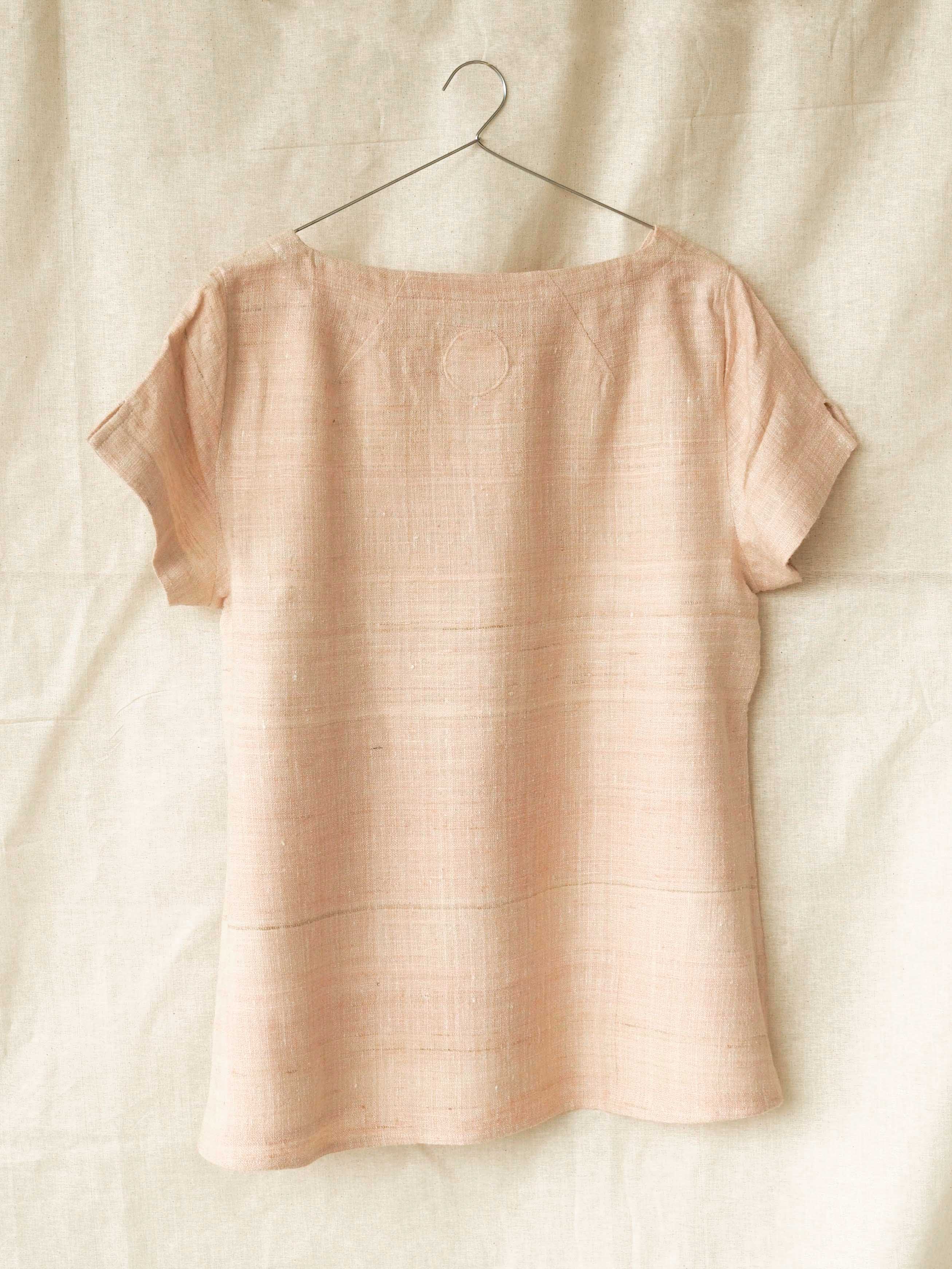 Handspun and handwoven eri silk shirt in a salmon and apricot color. 100% natural fiber and naturally dyed with Indian madder roots. Ethically made, slow fashion, simplicity.