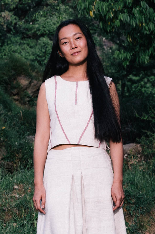 Handspun and handwoven eri silk top in a pink and cream color. 100% natural fiber and naturally dyed with lac. Ethically made, slow fashion, simplicity.