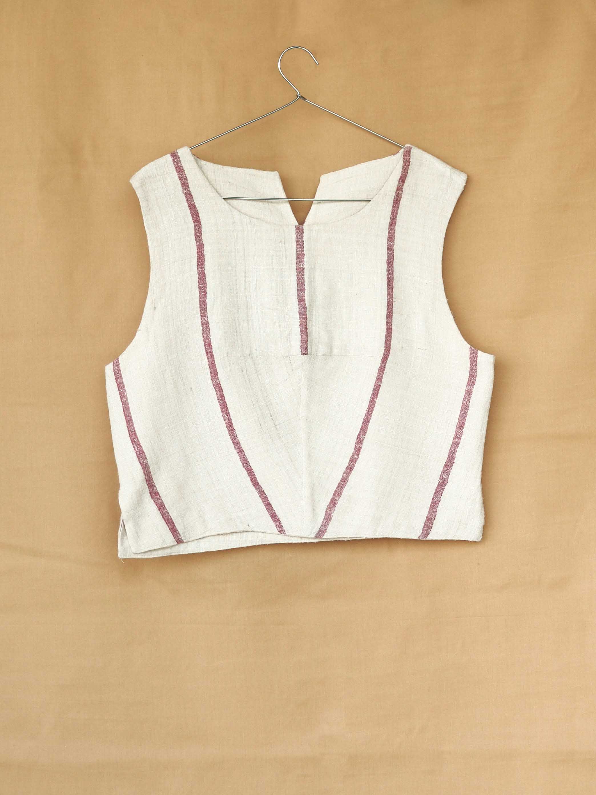 Handspun and handwoven eri silk top in a pink and cream color. 100% natural fiber and naturally dyed with lac. Ethically made, slow fashion, simplicity.