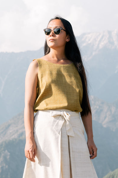 Handspun and handwoven eri silk top in a mustard color. 100% natural fiber and naturally dyed with onion skins. Ethically made, slow fashion, simplicity.