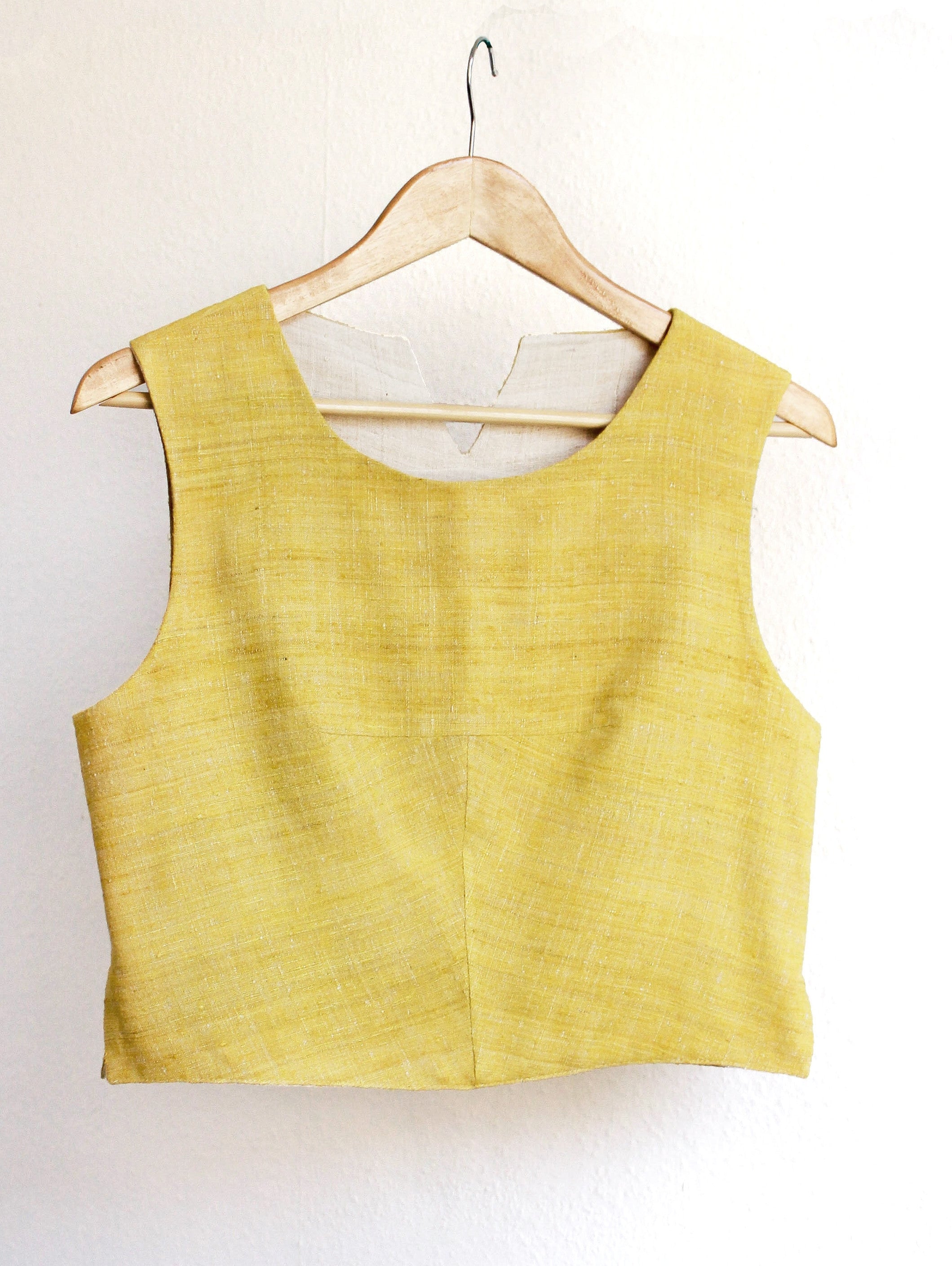 Handspun and handwoven eri silk top in a yellow color. 100% natural fiber and naturally dyed with turmeric. Ethically made, slow fashion, simplicity.