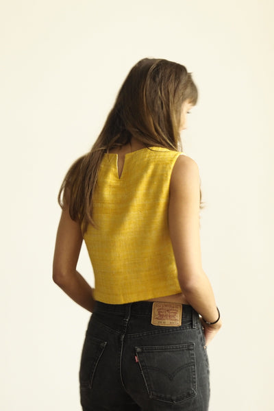 Handspun and handwoven eri silk top in a yellow color. 100% natural fiber and naturally dyed with turmeric. Ethically made, slow fashion, simplicity.
