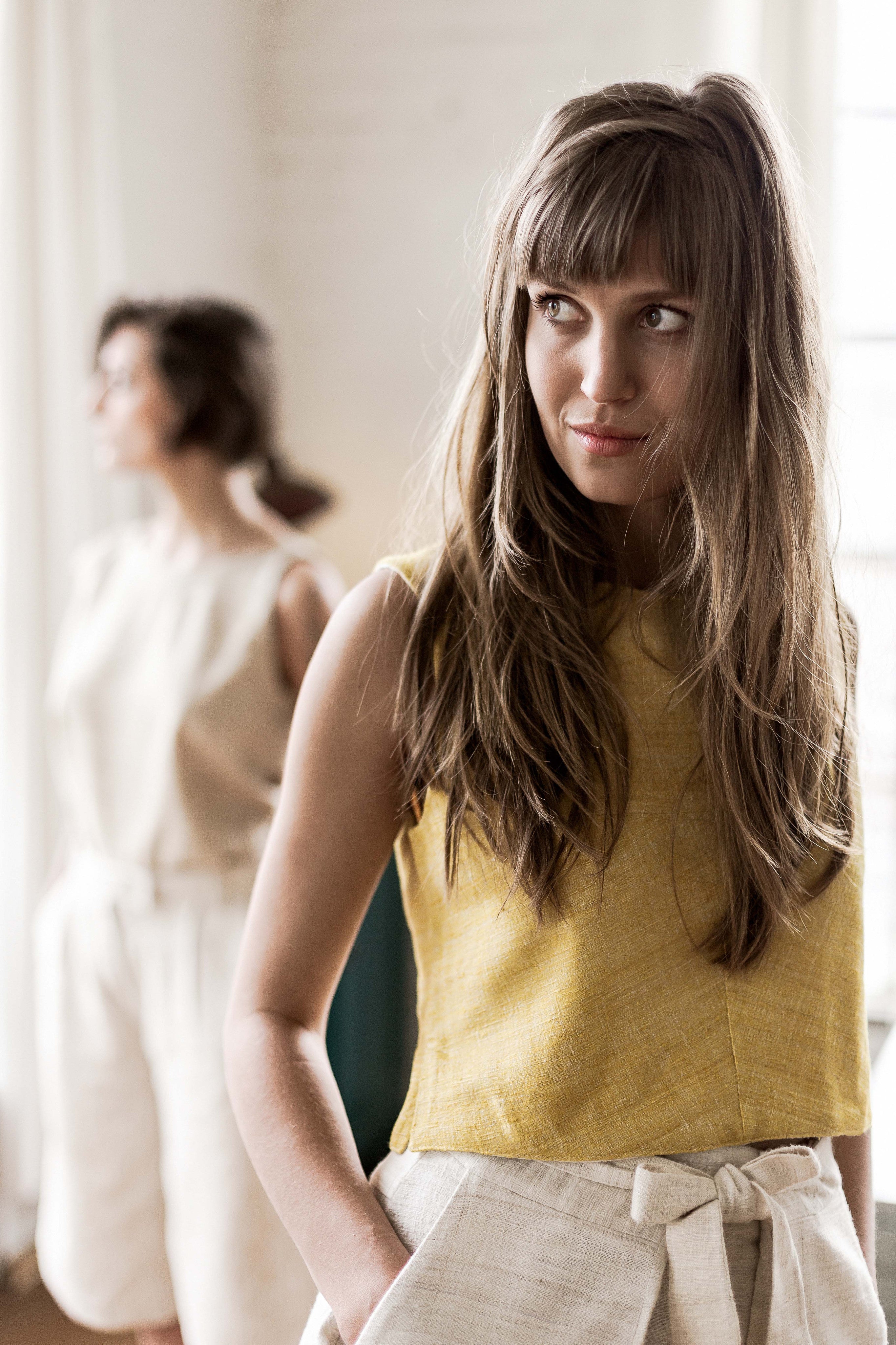 Handspun and handwoven eri silk top in a yellow color. 100% natural fiber and naturally dyed with turmeric. Ethically made, slow fashion, simplicity.